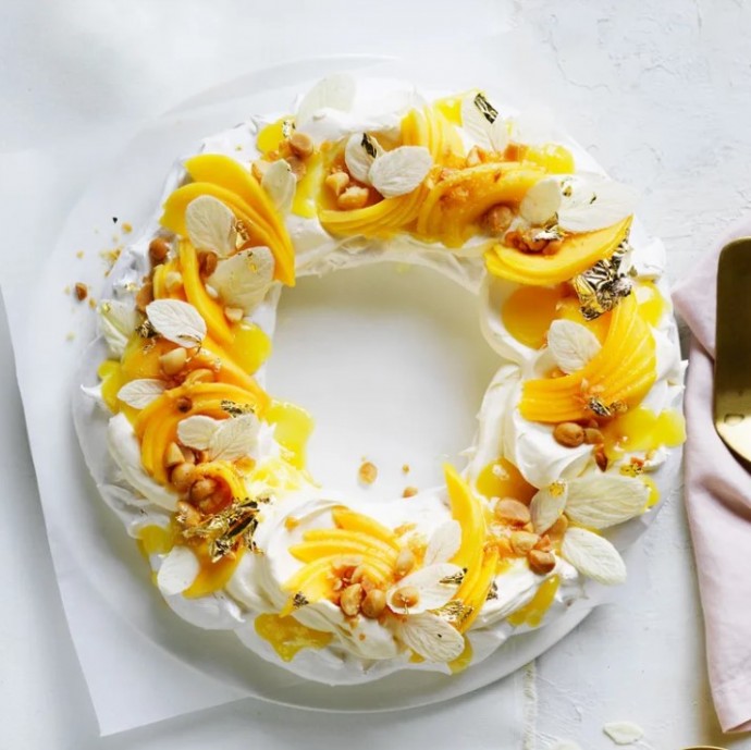Mango, macadamia and spiced white chocolate pavlova wreath Mango, macadamia and spiced white chocolate pavlova wreath