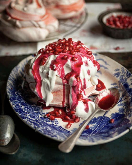 Pink meringues with pomegranate syrup